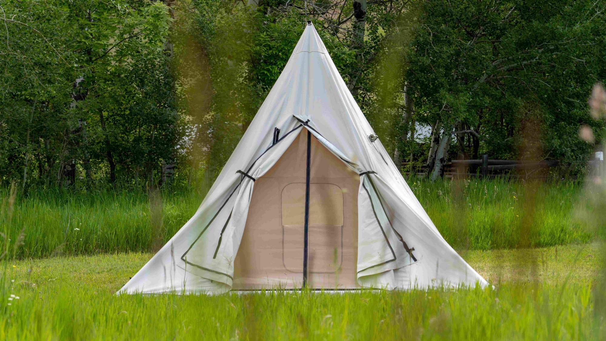 Canvas teepee shop tent with stove